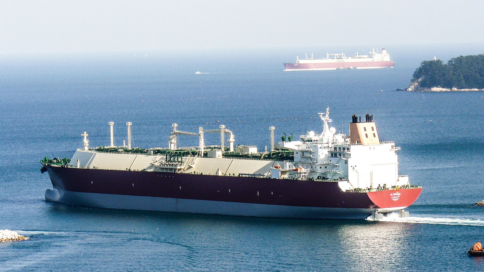Two Nakilat vessels sailing by each other in international waters